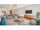 Open-concept living room, virtually staged with modern furniture, connecting to other living areas at 101 Hardwood Ln, Canton, GA 30115