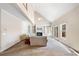 Bright living room with vaulted ceilings, built-in bookshelves, and a cozy fireplace at 101 Hardwood Ln, Canton, GA 30115
