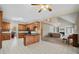 Open concept kitchen and living room featuring hardwood cabinets and vaulted ceilings at 101 Hardwood Ln, Canton, GA 30115