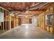 Unfinished basement with exposed insulation, ducts, and a concrete floor, offering potential for customization at 101 Hardwood Ln, Canton, GA 30115