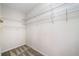 This walk-in closet has wall to wall shelving and carpeted floor at 101 Hardwood Ln, Canton, GA 30115