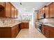Well-equipped kitchen with tile floors, stainless steel appliances, and granite countertops at 2304 New Haven Pl, Conyers, GA 30094