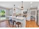 Bright kitchen featuring a center island, stainless steel appliances, and ample counter space at 3623 Summerford Dr, Marietta, GA 30062