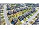 Expansive aerial view of a charming home nestled within a well-maintained neighborhood, outlined in yellow at 4217 Heisenberg Ln, Suwanee, GA 30024