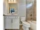 Modern bathroom features a white vanity with sleek fixtures and a tiled shower-tub combination at 4217 Heisenberg Ln, Suwanee, GA 30024