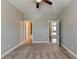 Bedroom featuring ceiling fan, neutral walls, and doorway to other rooms at 4217 Heisenberg Ln, Suwanee, GA 30024