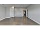 Spacious bedroom featuring hardwood floors and a view to another room at 4217 Heisenberg Ln, Suwanee, GA 30024