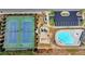 Overhead view of the community's amenities including tennis courts, pool, playground, and convenient parking at 4217 Heisenberg Ln, Suwanee, GA 30024