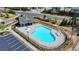 Inviting community pool featuring a splash area, diving board, and shaded seating for residents' enjoyment at 4217 Heisenberg Ln, Suwanee, GA 30024