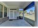 The covered patio features direct access to the backyard at 4217 Heisenberg Ln, Suwanee, GA 30024