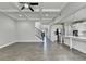 Bright kitchen with island, stainless steel appliances, and hardwood floors at 4217 Heisenberg Ln, Suwanee, GA 30024