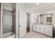 Modern bathroom with a sleek vanity, glass-enclosed shower, and neutral color palette at 4520 Garmon Nw Rd, Atlanta, GA 30327