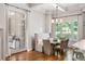 Cozy breakfast nook with a view of the outdoors through large windows and French doors at 4520 Garmon Nw Rd, Atlanta, GA 30327