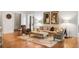 Open living room with neutral tones, hardwood floors, and a stylish area rug at 4520 Garmon Nw Rd, Atlanta, GA 30327