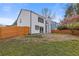 Home exterior shows fenced backyard and small patio at 1074 Wenham Ln, Lawrenceville, GA 30044