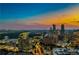 Stunning aerial view of the city skyline at sunset, highlighting the vibrant cityscape at 3630 Peachtree Ne Rd # 3302, Atlanta, GA 30326