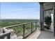 Relaxing balcony offers panoramic views of the lush greenery and distant city buildings at 3630 Peachtree Ne Rd # 3302, Atlanta, GA 30326