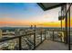 Beautiful sunset over the city from a private balcony with glass railings at 3630 Peachtree Ne Rd # 3302, Atlanta, GA 30326