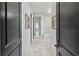 Hallway view of a luxurious bathroom with marble floors and elegant fixtures at 3630 Peachtree Ne Rd # 3302, Atlanta, GA 30326