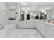 Lavish bathroom featuring marble floors, dual vanities, and soaking tub at 3630 Peachtree Ne Rd # 3302, Atlanta, GA 30326