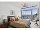 Bright bedroom with floor to ceiling windows and city views at 3630 Peachtree Ne Rd # 3302, Atlanta, GA 30326