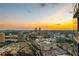 Breathtaking city view featuring an orange sunset, city skyline, and outdoor terrace at 3630 Peachtree Ne Rd # 3302, Atlanta, GA 30326
