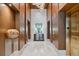 Hallway with elevators, wood paneling, decorative accents, and modern lighting at 3630 Peachtree Ne Rd # 3302, Atlanta, GA 30326