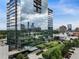 Modern glass high rise with city views and lush landscaping at 3630 Peachtree Ne Rd # 3302, Atlanta, GA 30326