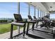 Bright gym featuring treadmills, exercise bikes, and large windows offering beautiful outdoor scenery at 3630 Peachtree Ne Rd # 3302, Atlanta, GA 30326