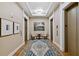 Hallway decorated with art and leading to elevators, complimented by neutral tones and modern lighting at 3630 Peachtree Ne Rd # 3302, Atlanta, GA 30326