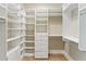 Spacious walk-in closet with custom shelving and ample storage space at 3630 Peachtree Ne Rd # 3302, Atlanta, GA 30326