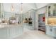 Bright kitchen featuring stainless steel appliances, a center island, and stylish pendant lighting at 3720 Harts Pl, Atlanta, GA 30341