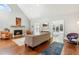 Bright living room featuring a fireplace, cozy seating, and natural lighting at 3720 Harts Pl, Atlanta, GA 30341