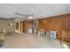 Finished basement area with an open layout, offering versatile space with carpet and tile at 820 Hounds Ridge Ct, Lawrenceville, GA 30043