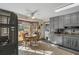 Bright kitchen with gray cabinetry, stainless steel appliances, and a cozy breakfast nook at 820 Hounds Ridge Ct, Lawrenceville, GA 30043