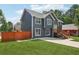 Stylish two-story home with gray siding, white trim, and a well-manicured lawn at 862 Gaston Sw St, Atlanta, GA 30310