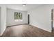 Spacious living room featuring sleek hardwood flooring and large windows offering plenty of natural light at 862 Gaston Sw St, Atlanta, GA 30310