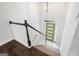 Staircase leads to the home's modern front door; staircase is lined with black-and-white railings at 862 Gaston Sw St, Atlanta, GA 30310