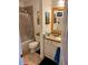 Bathroom featuring a shower-tub combo and vanity with granite countertop at 2611 Huntingdon Chase, Atlanta, GA 30350