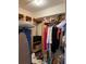 Walk-in closet featuring wood shelving for optimal organization and clothing storage at 2611 Huntingdon Chase, Atlanta, GA 30350