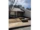 Exterior view of home entrance featuring steps and a covered entry way at 2611 Huntingdon Chase, Atlanta, GA 30350