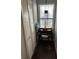 Hallway featuring a window, a desk and wood floors at 2611 Huntingdon Chase, Atlanta, GA 30350