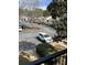 Residential street view with neatly parked cars, sidewalks, and well-maintained townhome exteriors at 2611 Huntingdon Chase, Atlanta, GA 30350