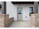 Inviting front door featuring brick accents and modern design at 2219 Nena Way # 22, Tucker, GA 30084
