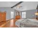 Large primary bedroom featuring hardwood floors and plenty of light at 3916 Loch Highland Ne Pass, Roswell, GA 30075