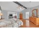 Spacious primary bedroom boasts hardwood floors and large windows at 3916 Loch Highland Ne Pass, Roswell, GA 30075