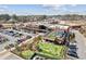 Upscale aerial view of a mixed-use development with mini golf and dining at 531 Burton Dr, Alpharetta, GA 30009