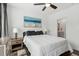 Comfortable bedroom featuring a ceiling fan, ensuite bathroom, and a soothing color palette at 531 Burton Dr, Alpharetta, GA 30009