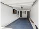 A clean, spacious garage featuring ample lighting, painted walls, and two access doors at 531 Burton Dr, Alpharetta, GA 30009