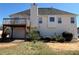 Backyard with a large deck extending from the house at 287 Bramlett Meadows Dr, Douglasville, GA 30134